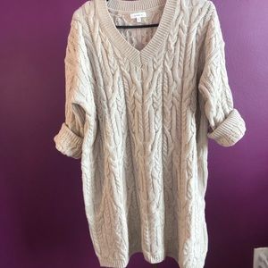 Beige sweater dress.